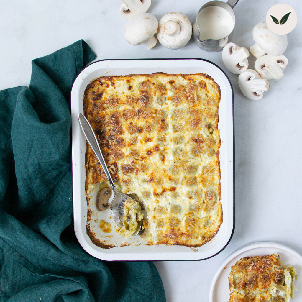 Gratin de ravioles du Dauphiné aux champignons et salade d'accompagnement